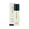 White cylindrical moisturizer bottle with a dark cap, standing beside a matching cream box labeled REJURAN moisturizer