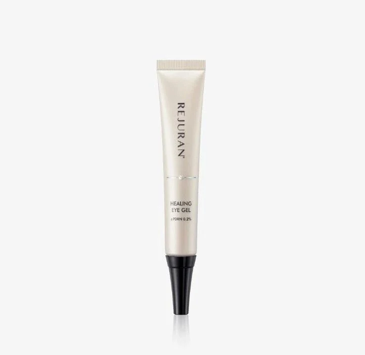 Tube of REJURAN Healing Eye Gel with a black applicator cap, standing upright against a light background.