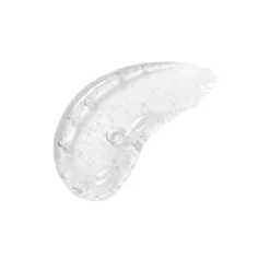 Close-up of a clear, gel-like substance with scattered bubbles on a white background, curved edge visible (gel/swirl).