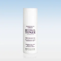 White cosmetic bottle labeled 'Retinol Toner' with 'Advanced Delivery Technology' text, standing upright against a pale blue gradient background.”,