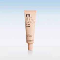 Beige tube of Eye Multi Tasker Retinol Serum standing upright on a reflective surface with a blue gradient background.