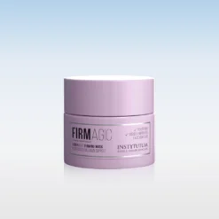 Pink cosmetic jar of 'Firm Magic' firming mask with plant-based collagen support, shown against a soft blue gradient background.