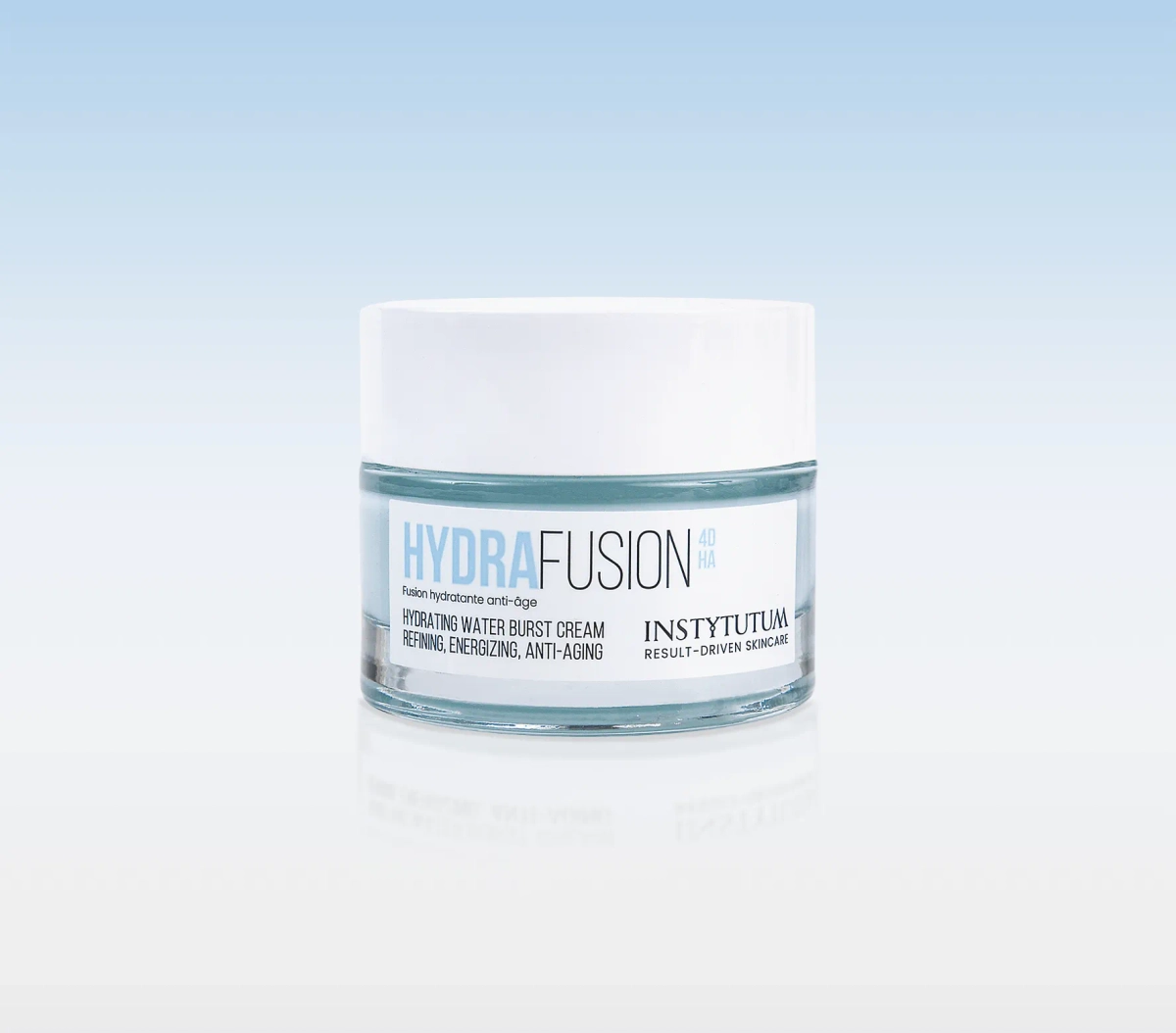 Cosmetic jar of HydraFusion hydrating cream on a light blue gradient background.
