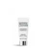 Tube labeled 'Transforming Melting Cleanser' with smaller text about deep clean and moisturizing, standing upright on a reflective surface on a white background (product shot).