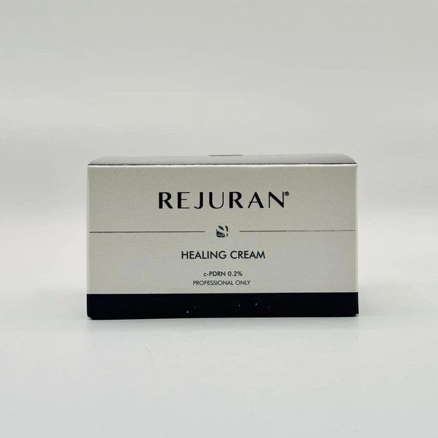 Box of Rejuran Healing Cream on a white surface, front label visible with logo