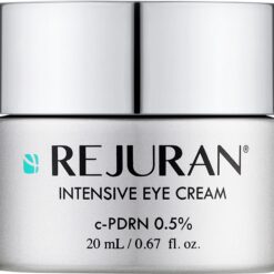 Close-up of a silver cosmetic jar with bold text reading 'REJURAN' and 'INTENSIVE EYE CREAM' visible on the label, 20 mL size indicated.