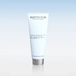 Tube of Instytutum Renewal Melting Cleanser against a pale blue gradient background, centered image