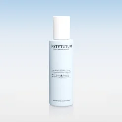 Bottle of Instytutum Resurfacing Glow Toner with a white cap on a pale blue gradient background