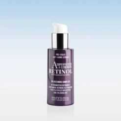 Purple pump bottle of retinol serum on a white surface with a blue gradient background, front label visible and legible.