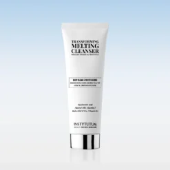 White tube of Transforming Melting Cleanser with bold black typography on a pale gradient background (blue to light gray).